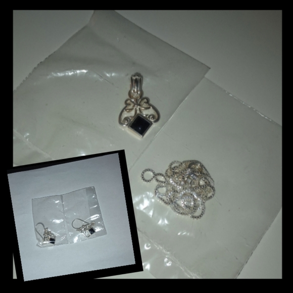 Avon Jewelry - Sterling silver necklace and pendant set